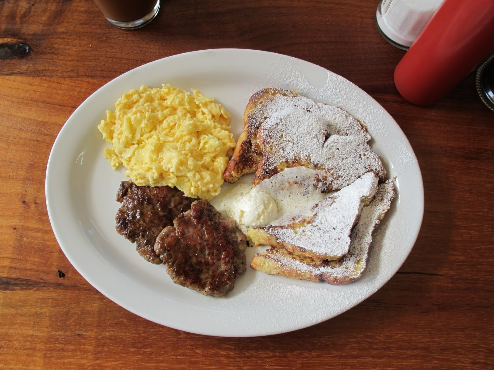 The Combo — french toast, scrambled eggs and sausage patties